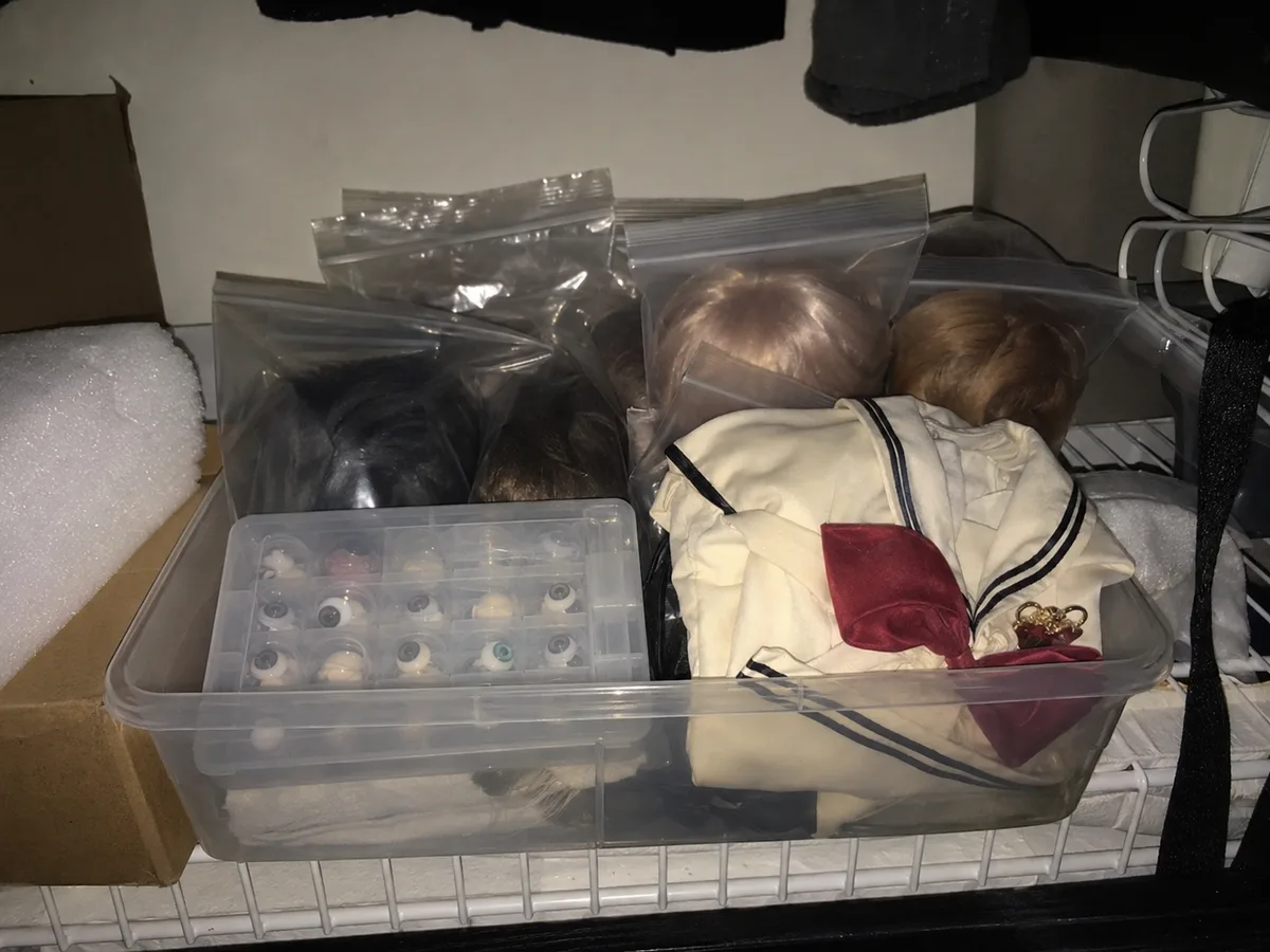 Closet storage after order: Accessories stored in a plastic organizer at home after delivery, showing the order is used and kept.