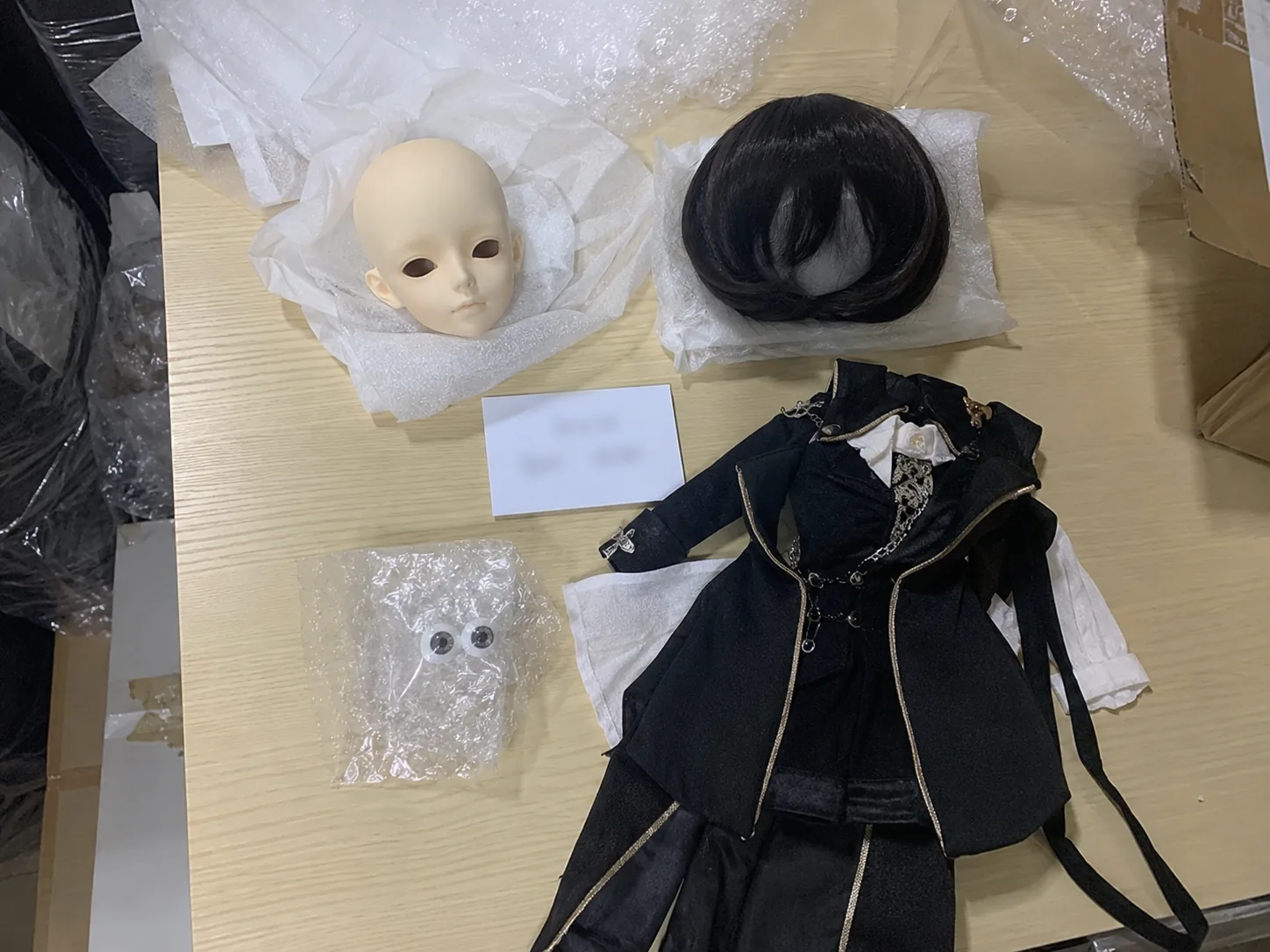 QC and packing proof: Photos can cover item arrival, faceup condition, wig/eye/outfit pairing, box protection, parcel label, and tracking.